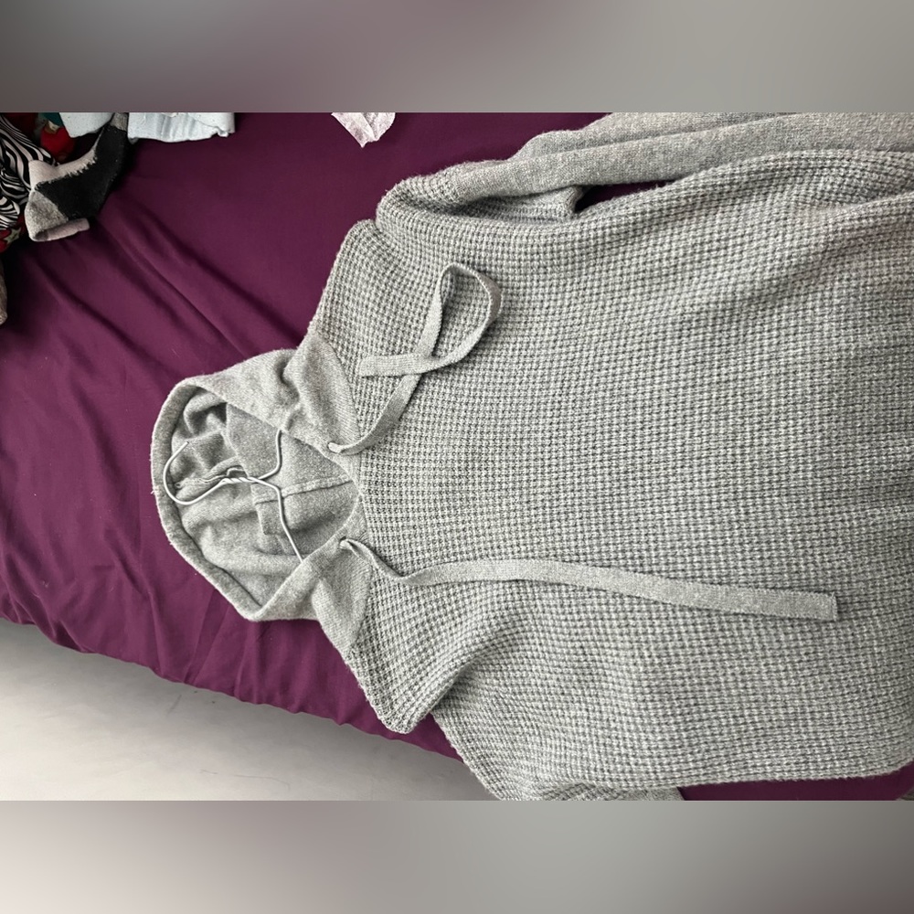 Red and gray kintted sweaters get one or both for a negotiable price